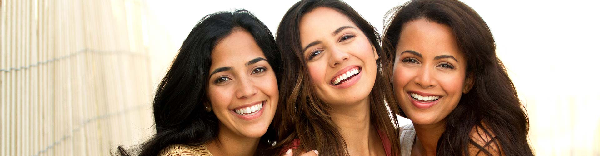 Beautiful Latin women smiling.
